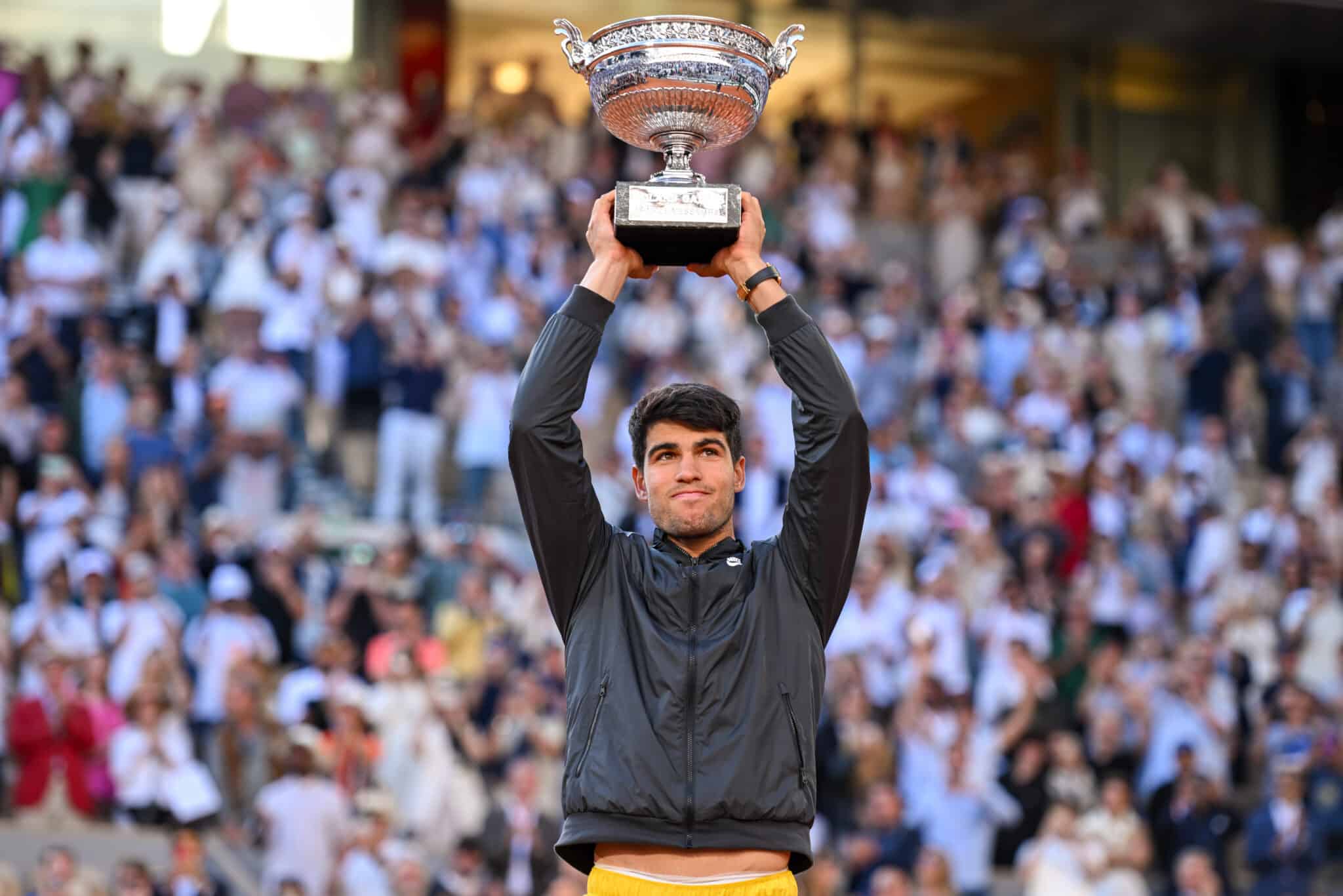 Fans at the French Open 2025 Roland Garros, with Court Philippe Chatrier in the background