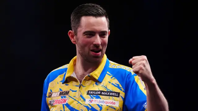 Luke Humphries celebrates his Premier League Darts win in Leeds