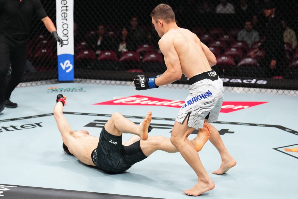 Bekzat Almakhan unleashes a powerful kick during UFC 315.