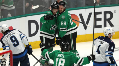 NHL playoffs action on the ice featuring two teams in a heated postseason battle