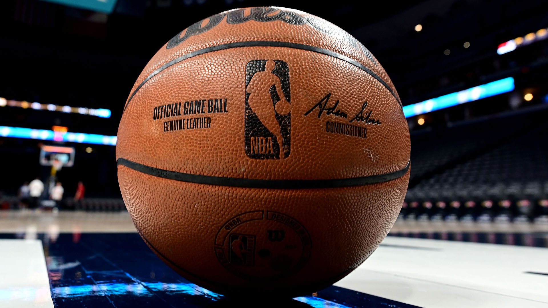 A competitive NBA basketball game in action, illustrating the latest nba scores
