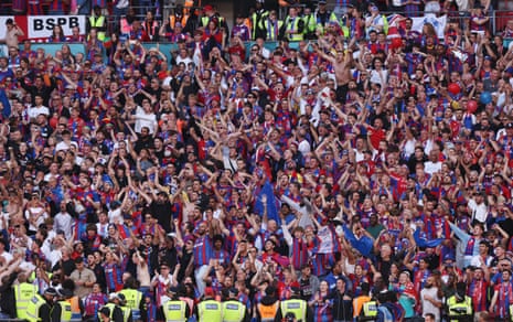 Crystal Palace fans celebrating with players after FA Cup win