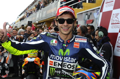 Valentino Rossi at the paddock, MotoGP legend in signature yellow suit