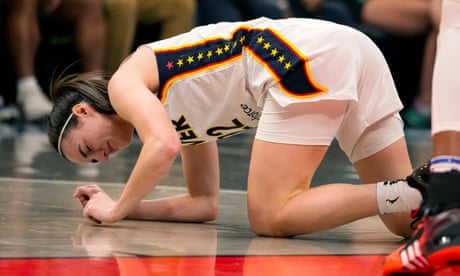 Angel Reese preparing for a rebound in the WNBA