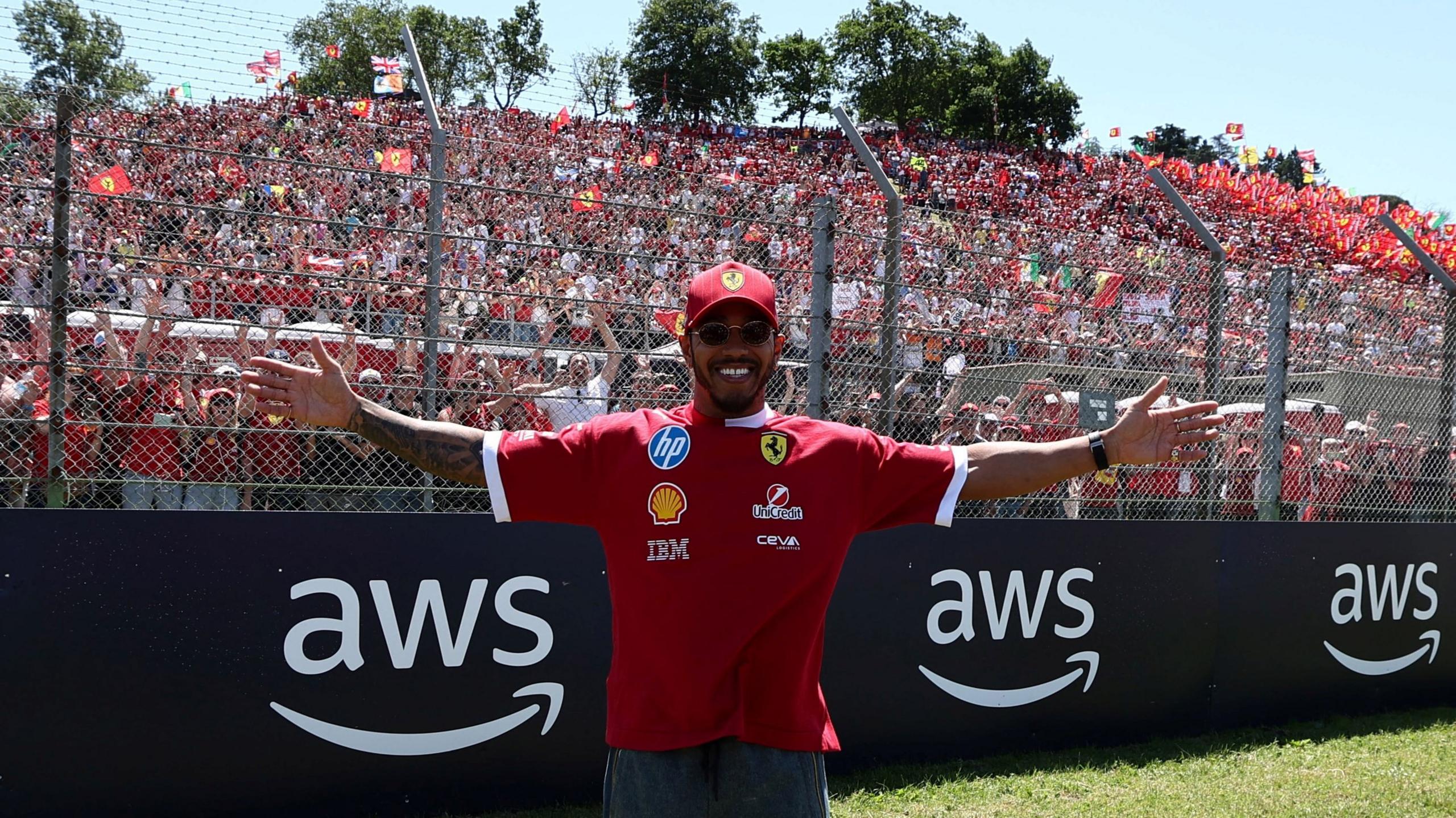 Lewis Hamilton racing at Imola GP in Ferrari colours
