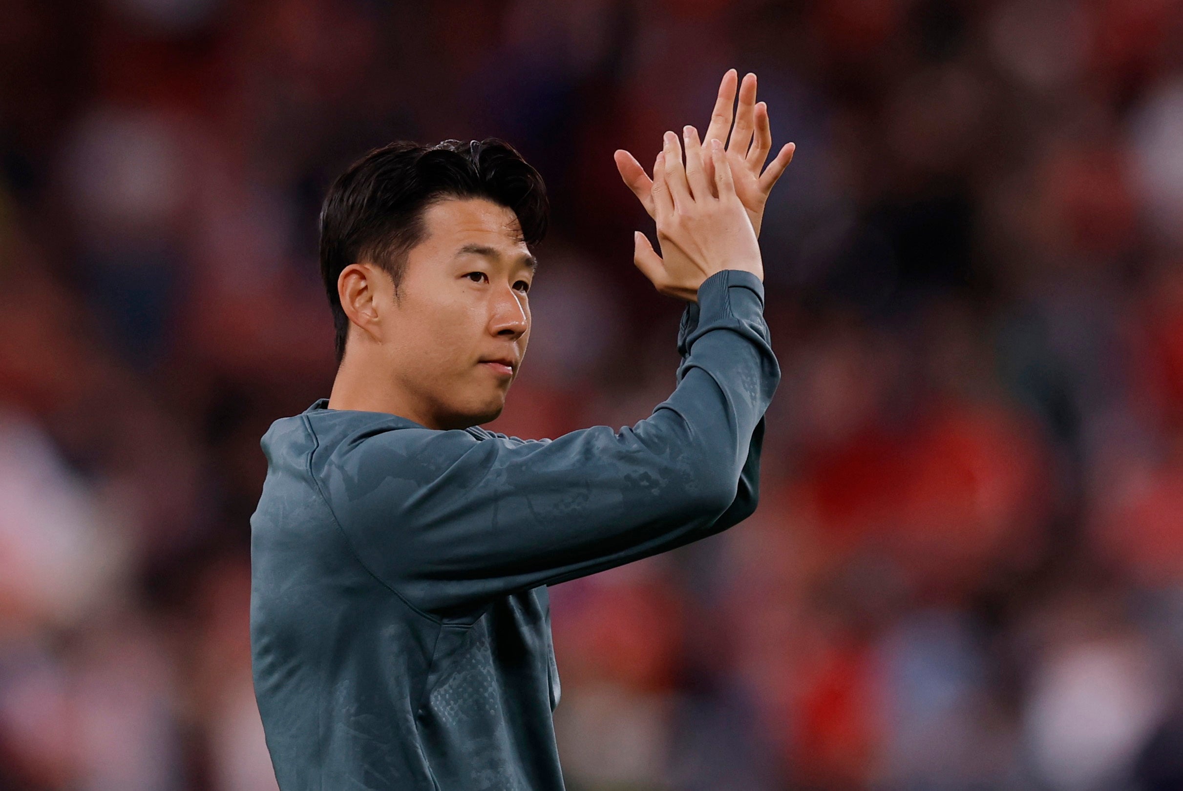 Heung Min Son celebrates a crucial goal for Tottenham Hotspur in the Europa League.