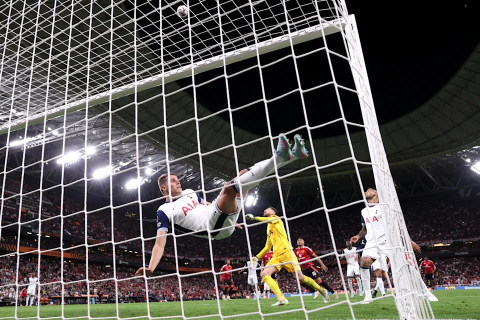 Micky van de Ven saving a goal during the Europa League final